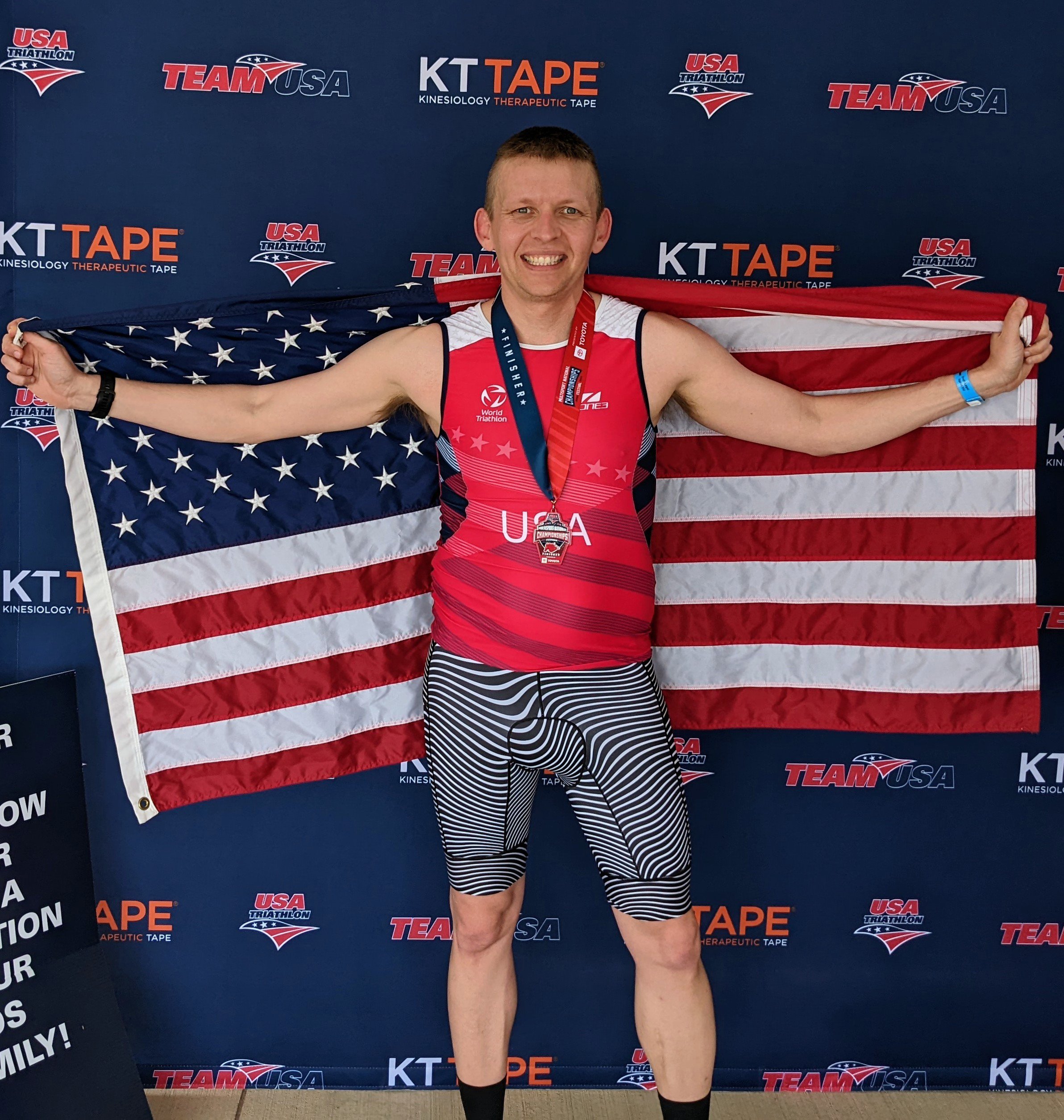 Scott Nelson on the podium at the 2022 Multisport Festival