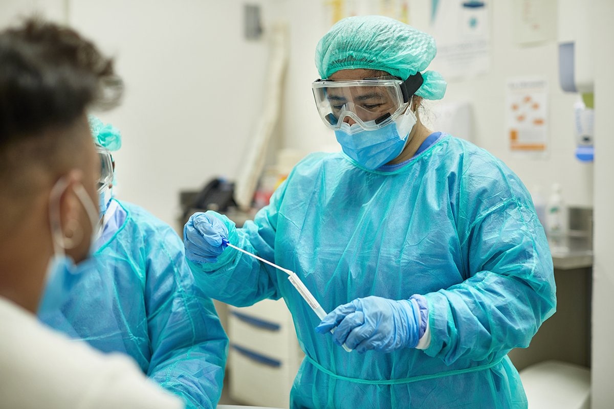 Nurse preparing a nasal swab