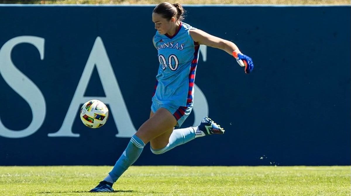 Image of Sophie Dawe kicking a soccer ball